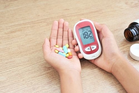Women with Hand of Pills